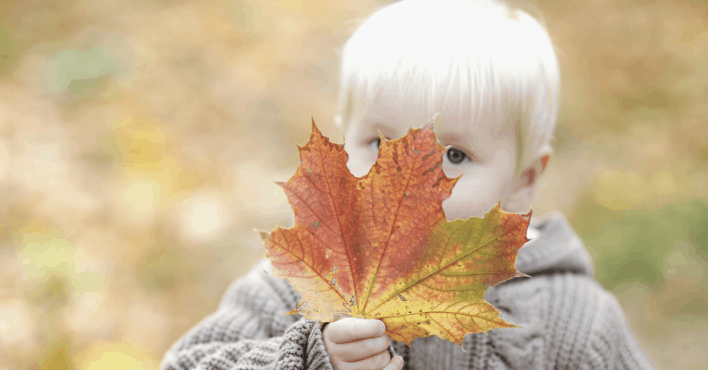 Child with leaf