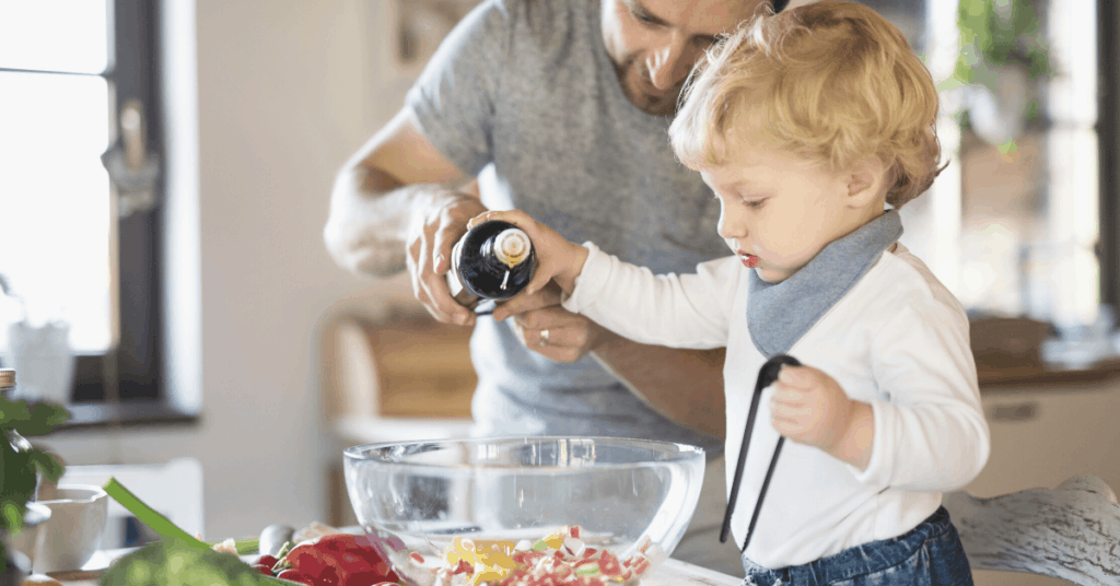 parent and toddler cooking