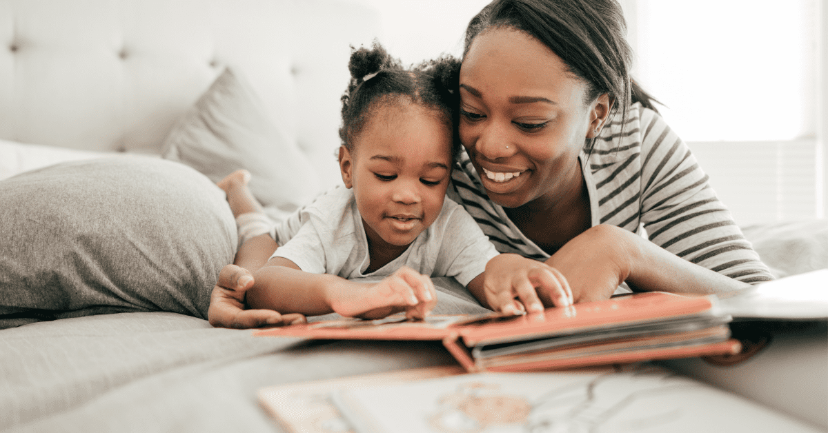 parent and toddler reading a story