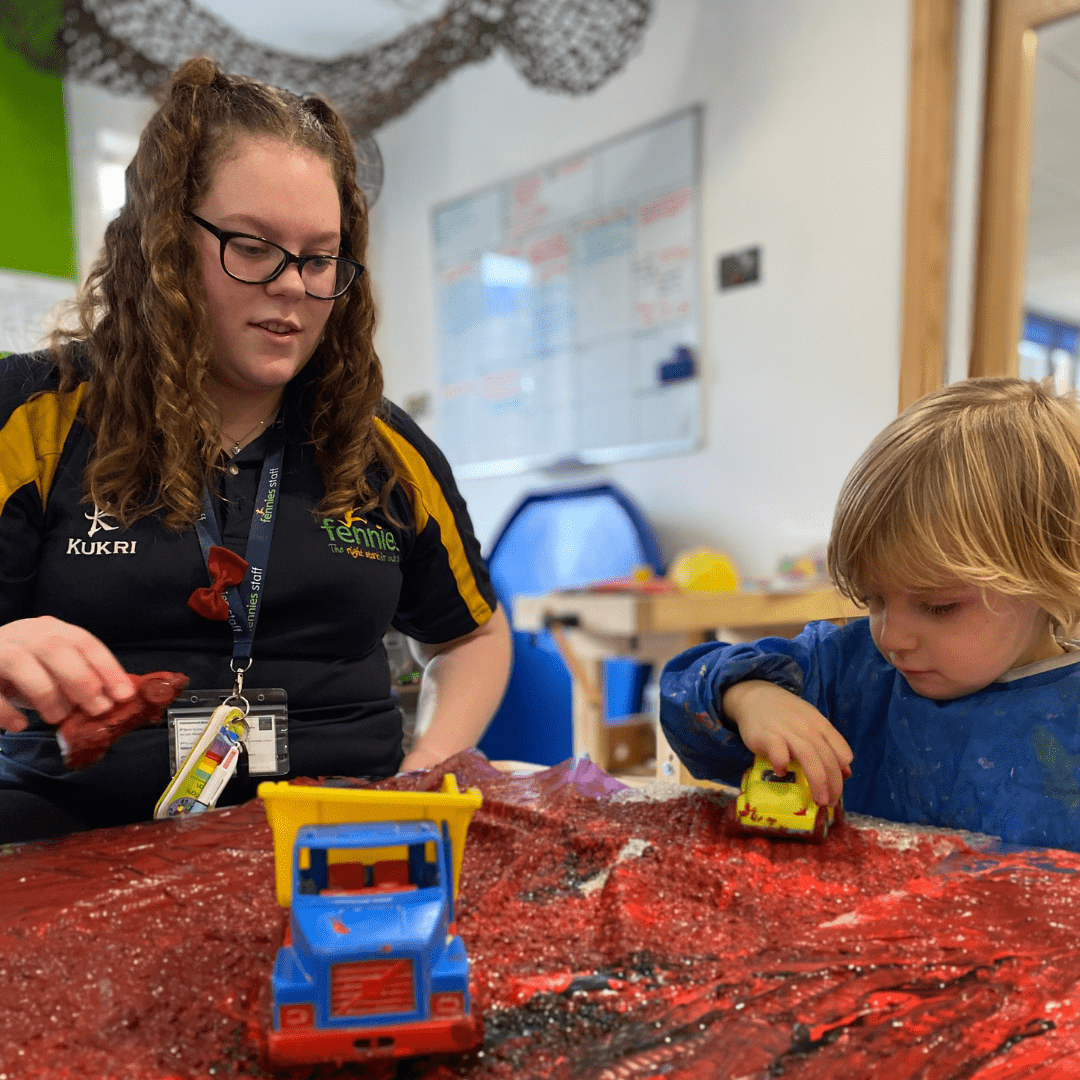 nursery practitioner and child activity