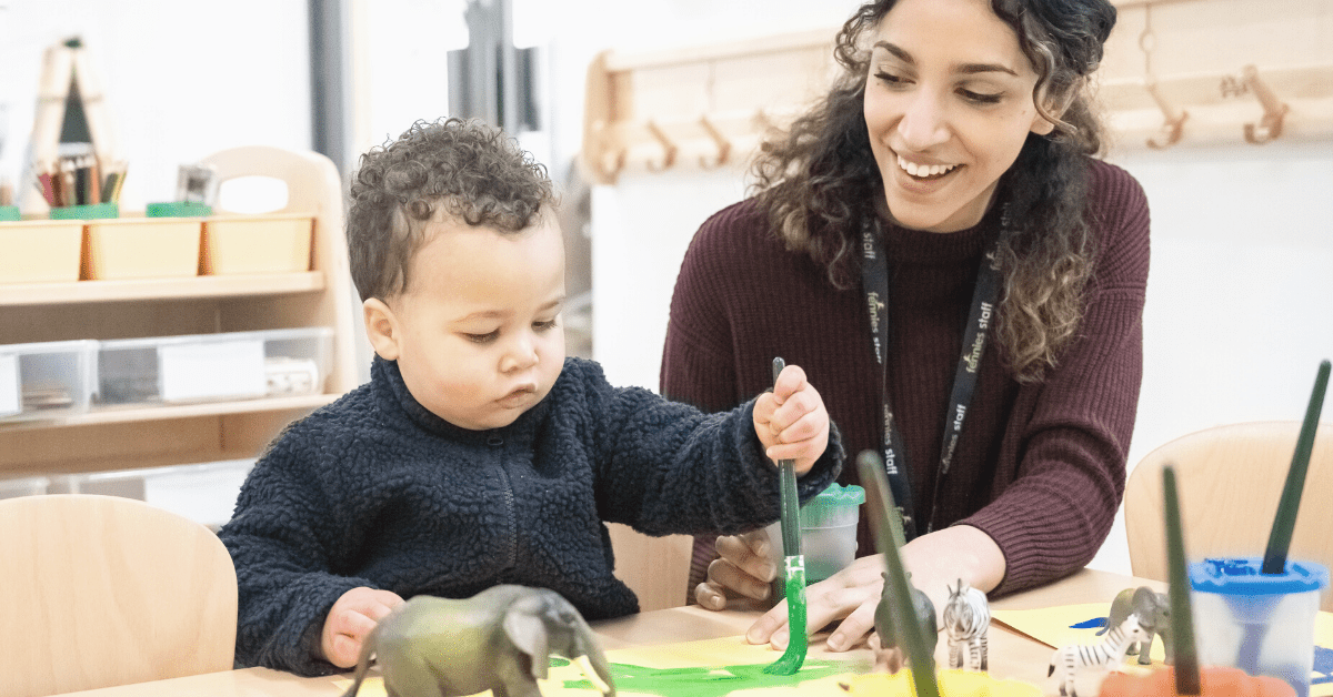 parent and child interacting in nursery