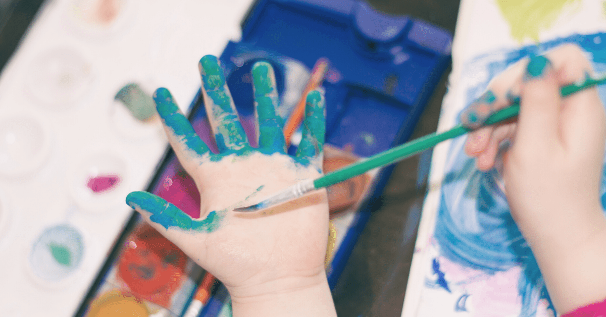 toddler painting hands