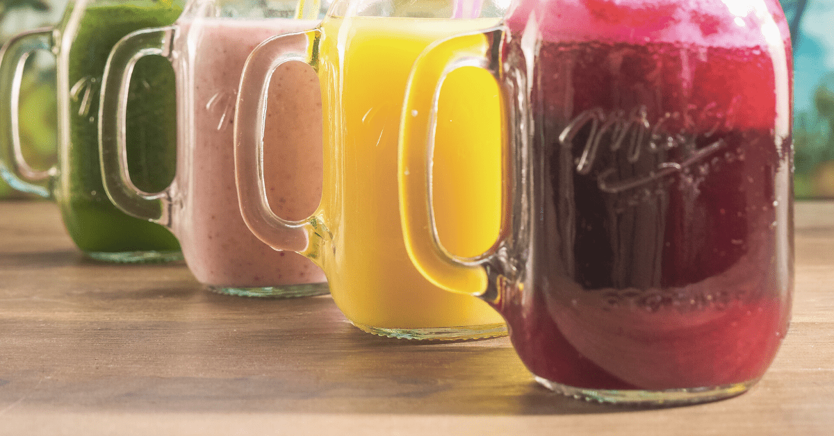 jars of different colured liquids