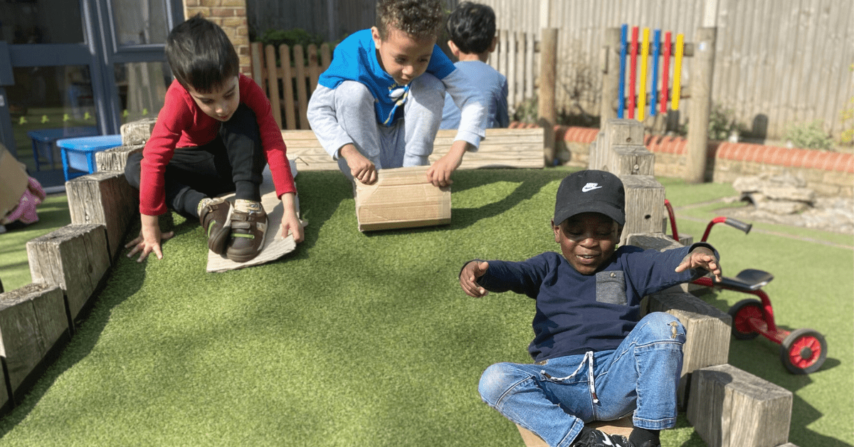 children playing together in nursery garden